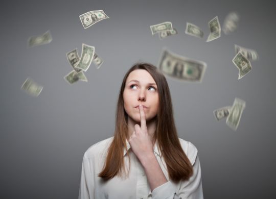 Girl in white and dollars.