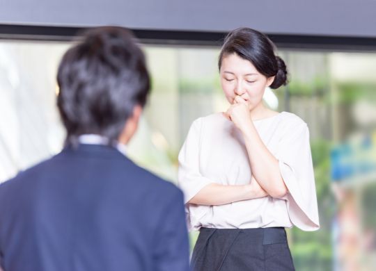 Japanese Businessman are listening woman's talking